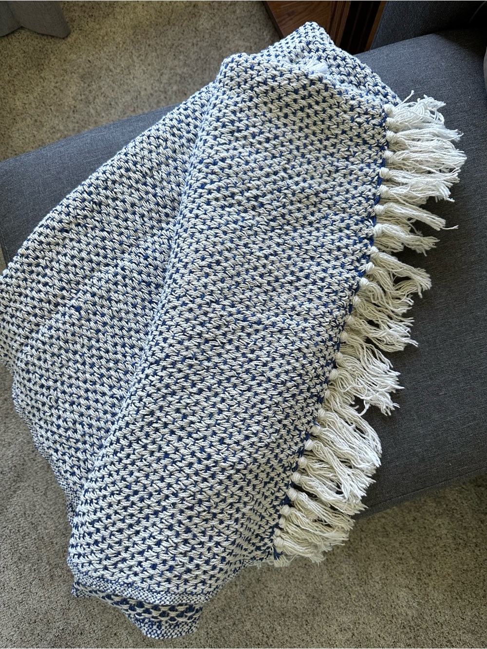 Cotton throw blanket woven blue and white measuring approx 46 x 67 inches.